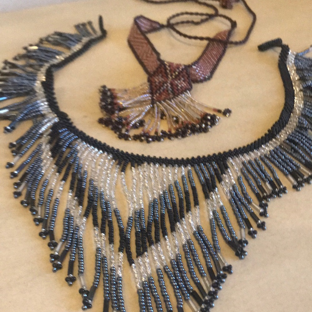 2 beaded necklaces.